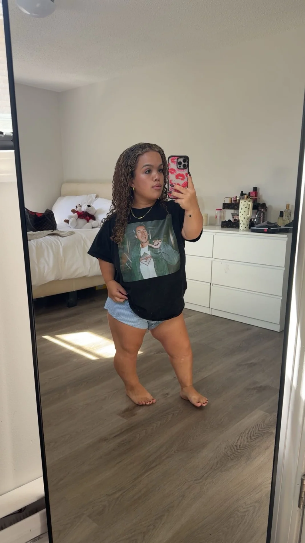 Liana taking a mirror selfie